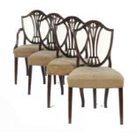 A SET OF FOUR GEORGE III MAHOGANY DINING CHAIRS,  C1800  including an elbow chair  92cm h ++Back