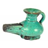 A PERSIAN TURQUOISE GLAZED POTTERY LAMP, 16TH-18TH C  6.6cm h ++ Minor old chipping around the rim