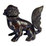 A CHINESE BRONZE MODEL OF A DOG OF FO, 17/18TH C  8cm h ++ Tail slightly loose but in otherwise good