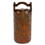 A JAPANESE CARVED BAMBOO FLASK, MEIJI  a scene to the front, the reverse with Tanuki the mythical