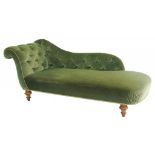 A VICTORIAN CHAISE LONGUE ON TURNED OAK FEET