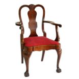 A GEORGE II STYLE WALNUT ARMCHAIR WITH SHAPED ARMS AND SEAT, ON CABRIOLE LEGS, CIRCA 1930