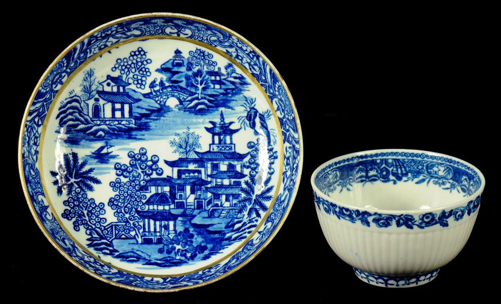 A WORCESTER REEDED TEA BOWL, C1780-85  transfer printed in underglaze blue with the rare Fluted - Image 2 of 2