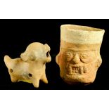 A PERUVIAN TERRACOTTA CUP, TIAHUANACO-HUARI, 11TH-12TH CENTURY  modelled as the head of a spirit,