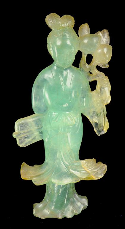 A CHINESE SEA GREEN FLUORSPAR CARVING OF A MAIDEN HOLDING A PEACH BOUGH, LATE 19TH/EARLY 20TH C 19cm - Image 2 of 2