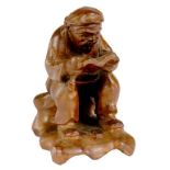 A JAPANESE CARVED WOOD FIGURE OF A MAN READING A BOOK, MEIJI  10cm h ++ In good condition