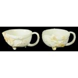 A PAIR OF BOW PEACH SHAPED CREAM BOATS, C1750-54 with applied prunus decoration, 12.5 l ++ Both with