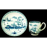 A MATCHED WORCESTER COFFEE CUP AND SAUCER, C1770  painted in underglaze blue with the Cannon Ball