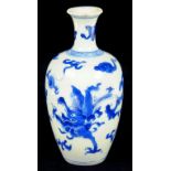 A CHINESE BLUE AND WHITE DRAGON VASE, KANGXI of slightly tapered form with waisted neck, 15cm h,