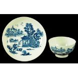 A WORCESTER TEA BOWL AND SAUCER, C1760 transfer printed in underglaze blue with the Man in the