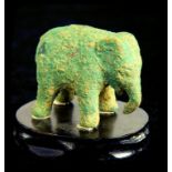 A CHINESE BRONZE MINIATURE MODEL OF AN ELEPHANT, HAN DYNASTY  uneven green patina, 4cm l (ex David