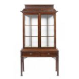 A MAHOGANY PAGODA TOPPED CHINA CABINET, C1930  the apron fitted with two drawers, 172cm h; 39 x 89cm
