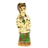 A CHINESE CIZHOU MINIATURE FIGURE OF A LADY, SONG DYNASTY  painted in brown over a cream glaze