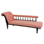 AN EDWARDIAN CARVED AND STAINED MAHOGANY CHAISE LONGUE