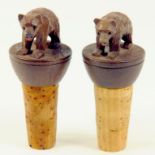 TWO SWISS CARVED LIMEWOOD BEAR CORK BOTTLE STOPPERS