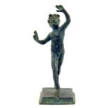 A BRONZE STATUETTE OF THE DANCING FAUN, AFTER THE ANTIQUE
