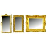 A VICTORIAN GILTWOOD AND COMPOSITION MIRROR WITH SHAPED SHELF, A GILT PICTURE FRAME, A MIRROR AND