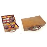 A LEATHER GENTLEMAN'S DRESSING SET CONTAINING THE FULL SET OF NICKEL PLATED AND OTHER ACCESSORIES,