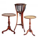 A MAHOGANY JARDINIERE WITH SLATTED SIDES AND TWO MAHOGANY TRIPOD TABLES