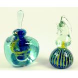 A MDINA GLASS TRIANGULAR SCENT BOTTLE AND STOPPER AND A MDINA GLASS SEAHORSE PAPERWEIGHT
