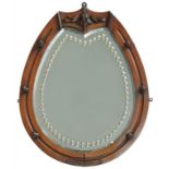 A VICTORIAN MAHOGANY HORSESHOE SHAPED MIRROR