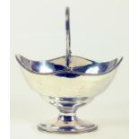 A GEORGE III SILVER SUGAR BASKET WITH SWING HANDLE AND BEADED RIM, LONDON 1787, 7OZS