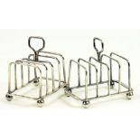 A PAIR OF GEORGE V SILVER FIVE HOOP WIREWORK TOAST RACKS, SHEFFIELD 1911, 2OZS 10DWTS