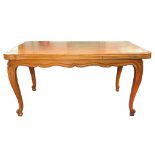 A FRENCH PROVINCIAL STYLE LIGHTWOOD DRAW LEAF TABLE WITH PARQUETRY TOP, ON CARVED CABRIOLE LEGS