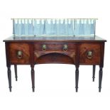 A GEORGE IV MAHOGANY AND BRASS INLAID SIDEBOARD WITH BRASS LION MASK AND RING HANDLES