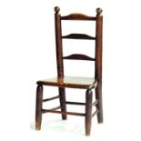 A VICTORIAN FRUITWOOD LADDER BACK CHILD'S CHAIR WITH ELM SEAT