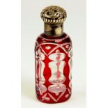 A VICTORIAN SILVER MOUNTED RUBY FLASHED AND CUT GLASS SCENT BOTTLE, UNMARKED