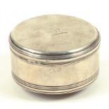 A SILVER CYLINDRICAL BOX AND COVER, CRESTED, MAKER'S MARK ONLY, EARLY 19TH CENTURY, 3OZS 10DWTS