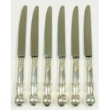 A SET OF SIX ELIZABETH II SILVER HAFTED TABLE KNIVES, SHEFFIELD 1965