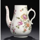 A LOWESTOFT POLYCHROME TEAPOT, C1775-80  with unusual handle, painted with large floral sprays and