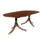 A GEORGE III STYLE MAHOGANY TWIN PILLAR DINING TABLE, MID 20TH C  74cm h; 105 x 230cm ++A good