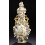A MINTON FLORAL ENCRUSTED  INDIAN VASE AND COVER, c1830  with cisélé gilt dragon handles and leaves,