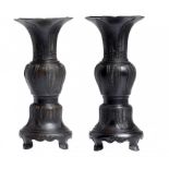 A PAIR OF CHINESE BRONZE VASES, 19TH/20TH C   cast with lappets, on four feet, 41cm h ++The pear