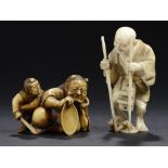 A JAPANESE STAINED IVORY OKIMONO OF A DRUNKEN SHUTEN DOJI AND A YAMABUSHI AND A NETSUKE OF A MAN