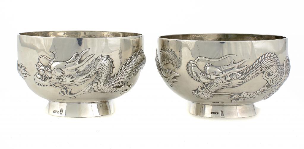 A PAIR OF CHINESE SILVER REPOUSSÉ DRAGON BOWLS, C1900  12cm diam, by Wang Hing & Co, marked WH 90