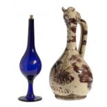 AN OTTOMAN BLUE GLASS FLASK AND STOPPER, PROBABLY BEYKOZ AND A CANAKKALE POTTERY EWER, BOTH 19TH