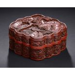 A FINE CHINESE CINNABAR LACQUER BOX AND COVER,  18/19TH C  20.5cm w, the cover carved with foxes