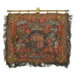 A VICTORIAN STATE TRUMPETER'S BANNER   of embroidered red silk worked in metal thread with arms,