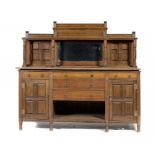 A VICTORIAN REFORMED GOTHIC OAK SIDEBOARD IN THE MANNER OF BRUCE TALBERT, C1865  with brass handles,