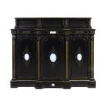 A VICTORIAN EBONISED AND GILT MAHOGANY SIDE CABINET, C1870   the plinth, three doors and apron inset