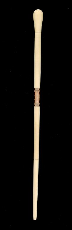 A GOLD MOUNTED IVORY CONDUCTOR'S BATON, 1903  with engraved presentation inscription of the