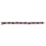 A RUBY AND DIAMOND BRACELET, LATE 20TH C in white gold, fully articulated  ++In fine condition,
