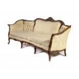 A CONTINENTAL CARVED BEECH CANAPE, EARLY 20TH C  with 230cm w ++Some rubbing and wear on the