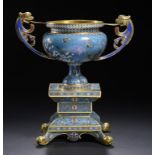 A CHINESE CLOISONNÉ ENAMEL DRAGON HANDLED VASE, LATE 19TH C the bowl with prunus, magnolia, cherry