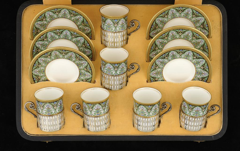 A SET OF SIX WEDGWOOD BONE CHINA COFFEE CUPS AND SAUCERS WITH SILVER HOLDERS, C1930   saucers 12cm
