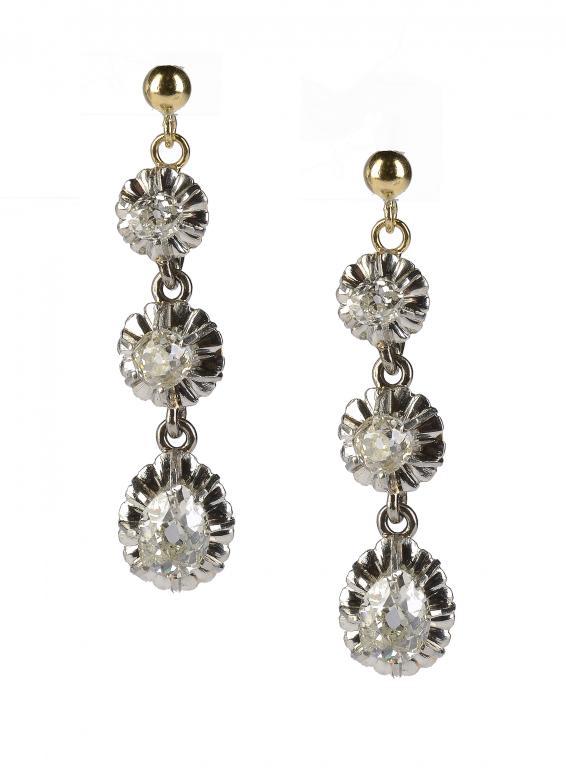 A PAIR OF DIAMOND EARRINGS  with larger pear shaped diamond, in gold, fully articulated  ++In fine